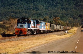 103 leads a mixed consist on a coal train ex Wongawilli