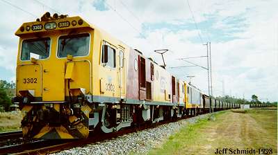 3302 leads a coal train in Qld